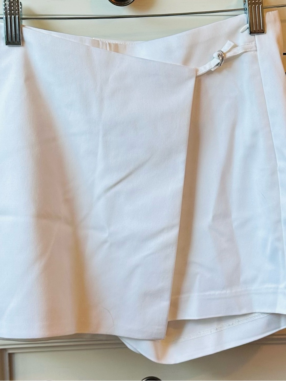 Dynamite white asymmetrical wrap skort in size 00 — New With Tags.